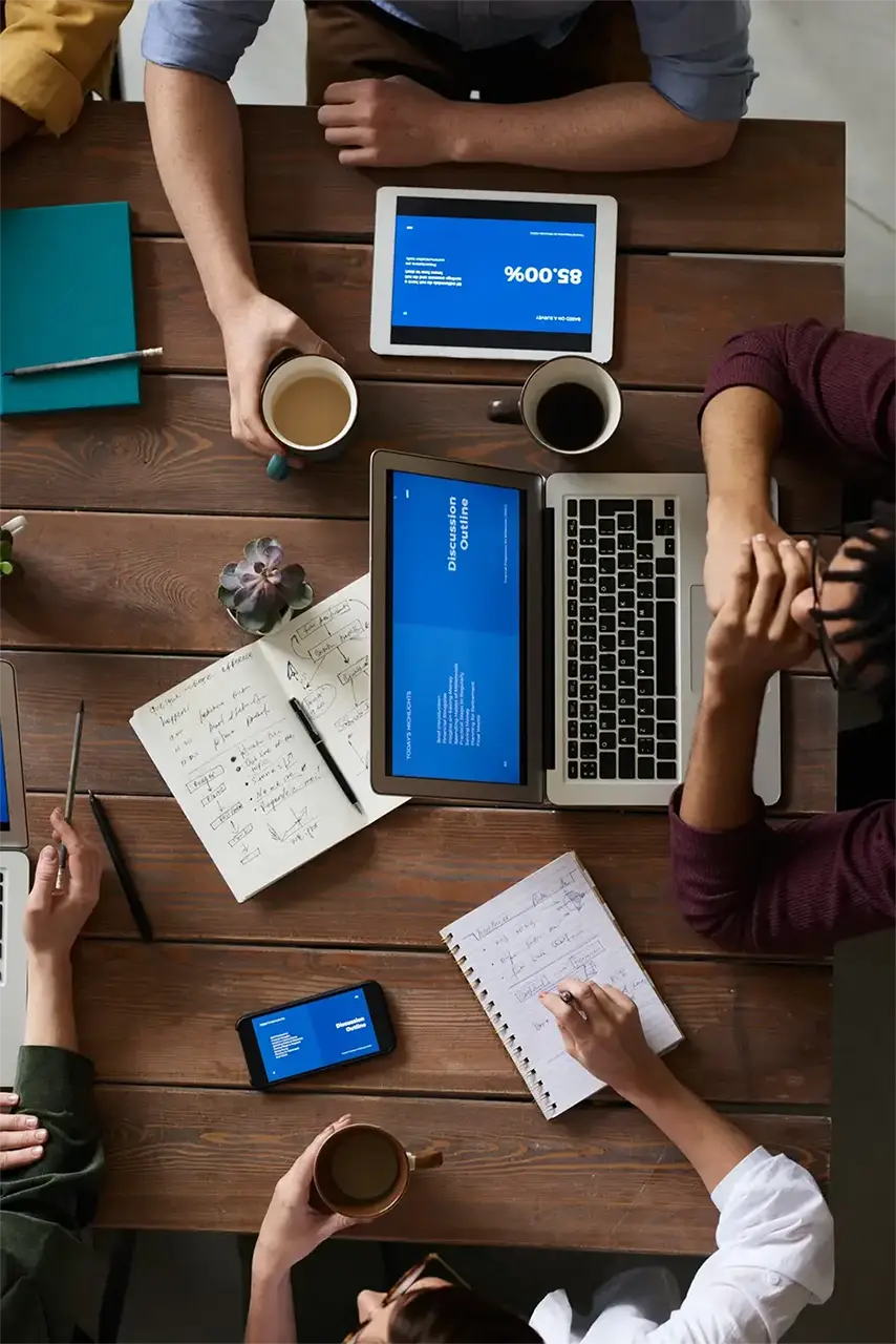 People working at a desk.